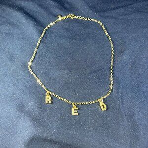 Gold-Tone Chain Necklace With "R E D" Letter Charms & Heart Detail